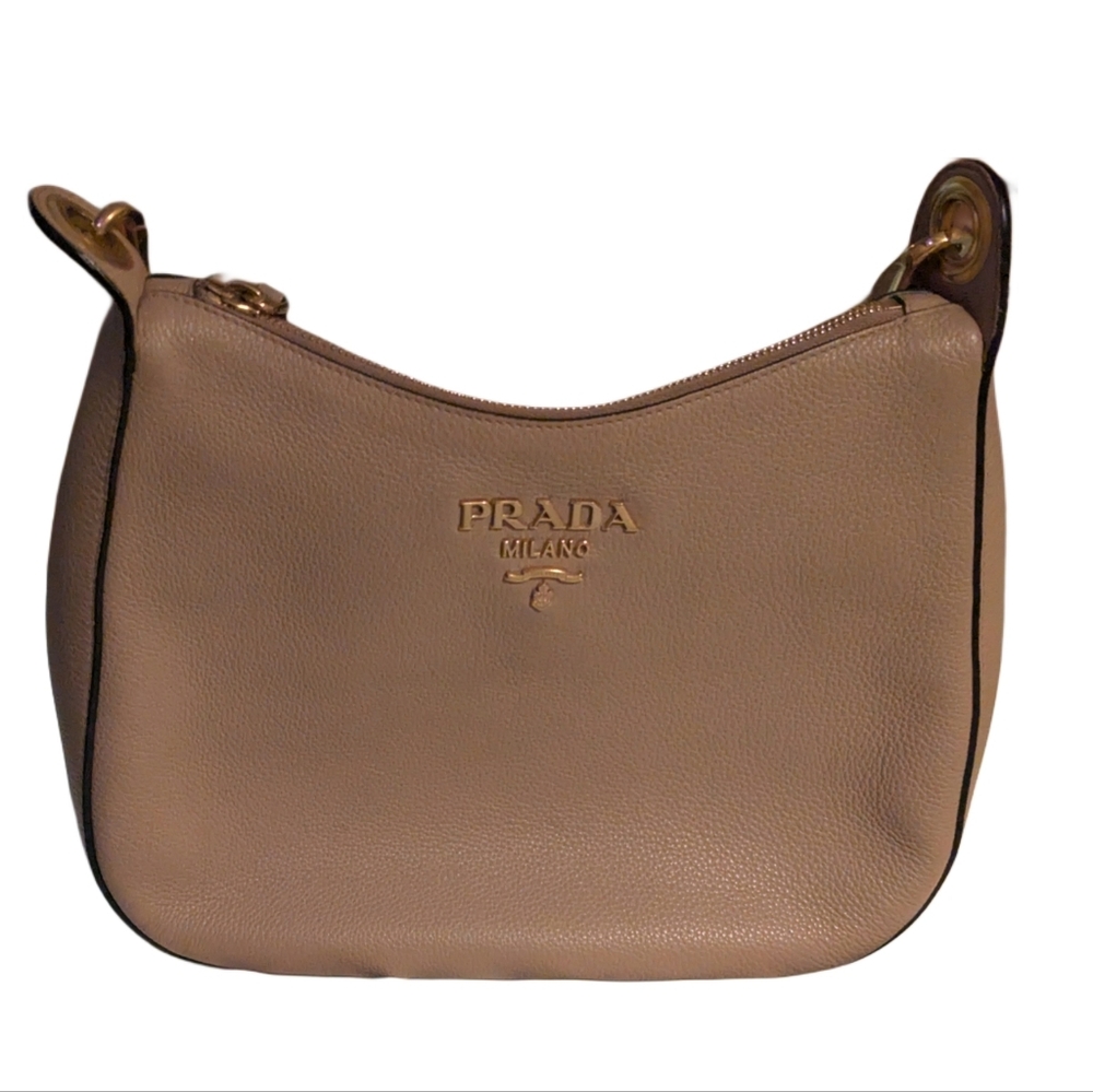 Prada Vitello Phenix leather web stripe crossbody bag in caramel brown. 